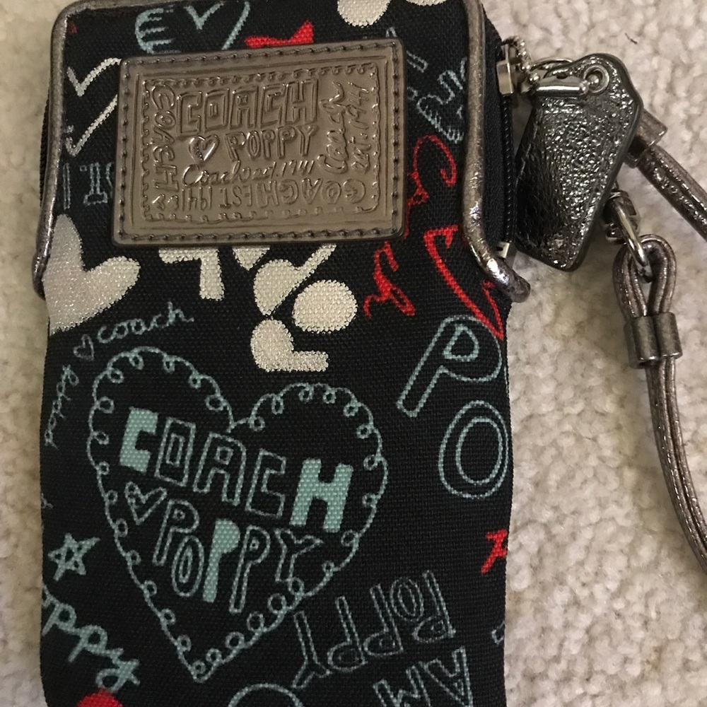 COACH wristlet. “Poppy” new without tags
